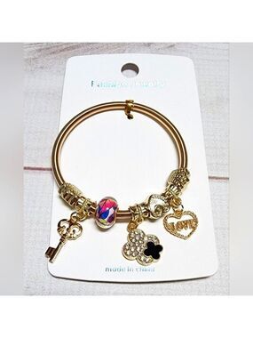 New Gold Sliding Charm Spring Bracelet